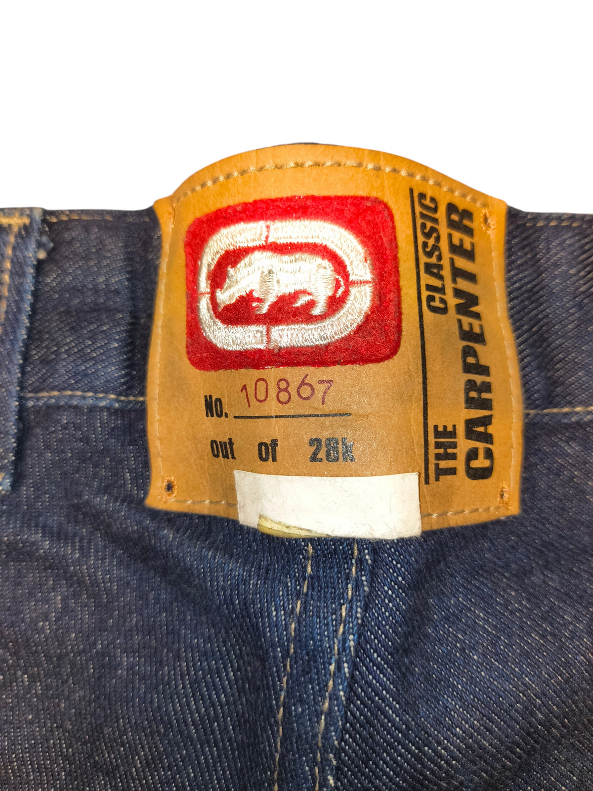 Awsum Thrift Ecko Shorts featuring a brown leather patch with the classic rhino logo and carpenter branding
