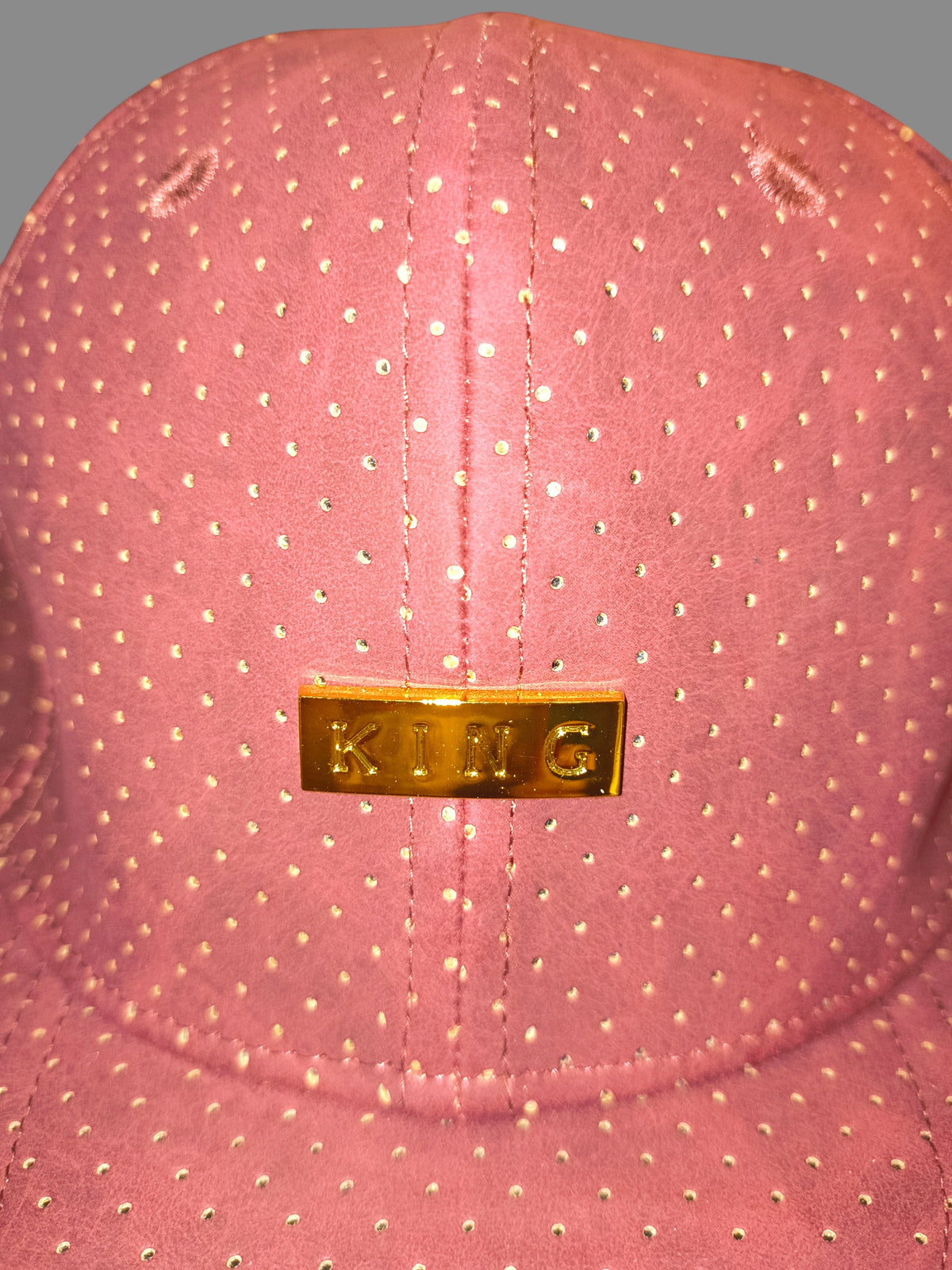 Awsum Thrift King Apparel maroon perforated faux-leather snapback hat with a polished gold metal logo plate