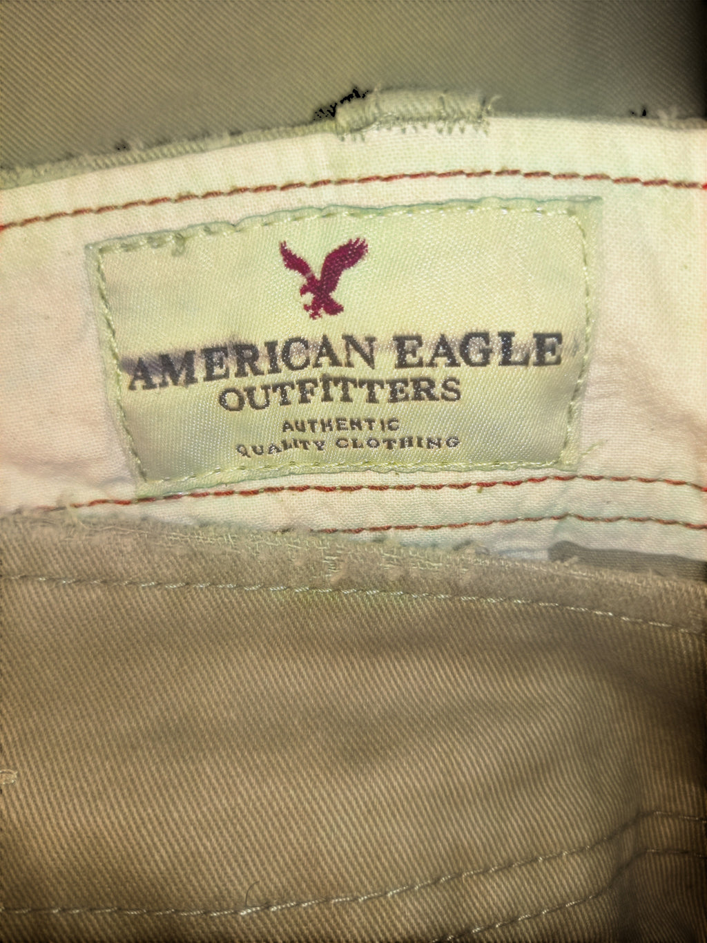 Awsum Thrift American Eagle Outfitters khaki cotton twill cargo shorts interior brand label with red stitching