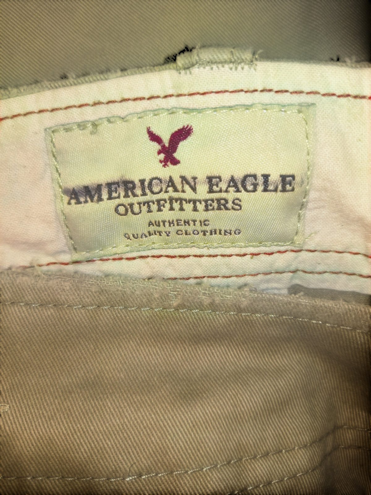 Awsum Thrift American Eagle Outfitters khaki cotton twill cargo shorts interior brand label with red stitching