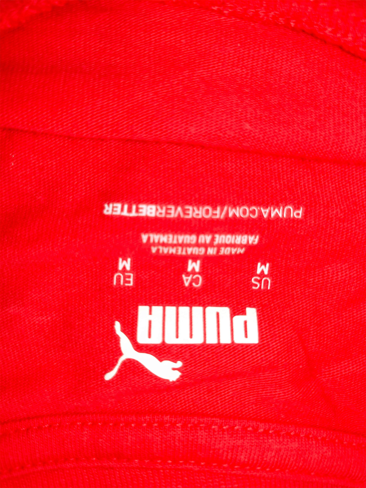 Awsum Thrift red Puma tee shirt interior neck label showing size medium and brand logo