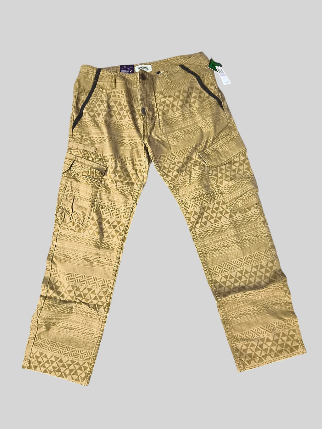 Awsum Thrift LRG khaki tan cotton cargo pants featuring an all-over southwest Aztec geometric print and utility pockets