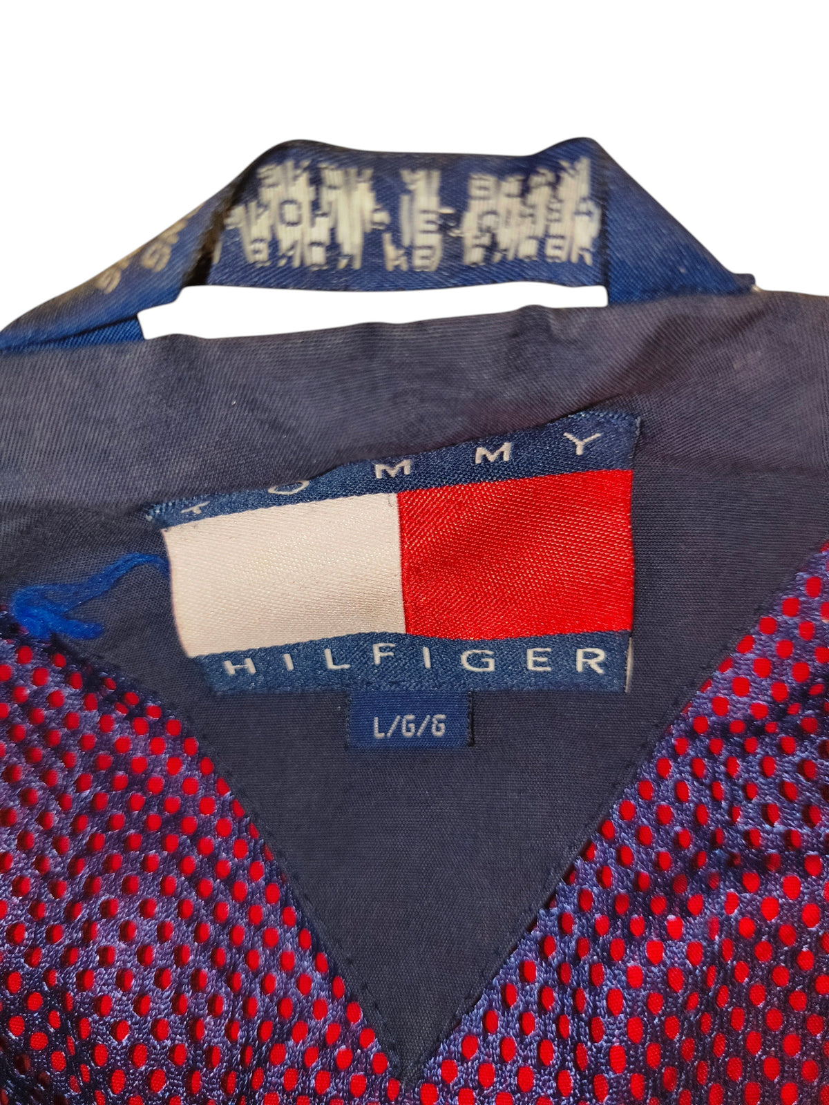 Awsum Thrift vintage Tommy Hilfiger jacket label with red and blue mesh lining and hideaway hood detail
