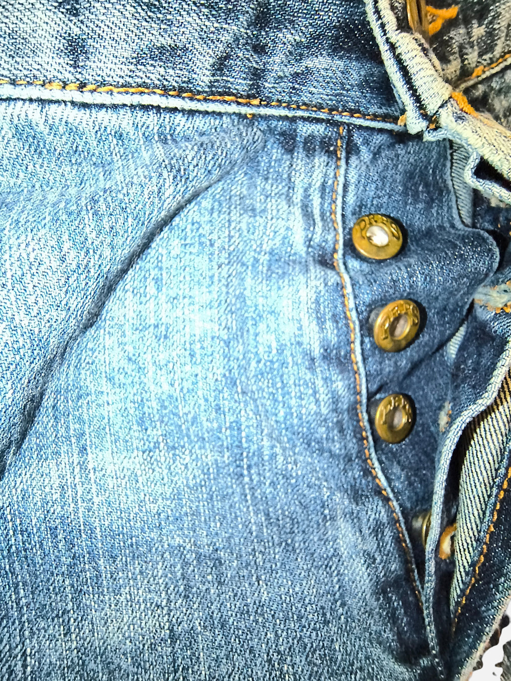 Awsum Thrift PRPS denim shorts featuring a classic button fly closure with branded metal buttons and contrast stitching