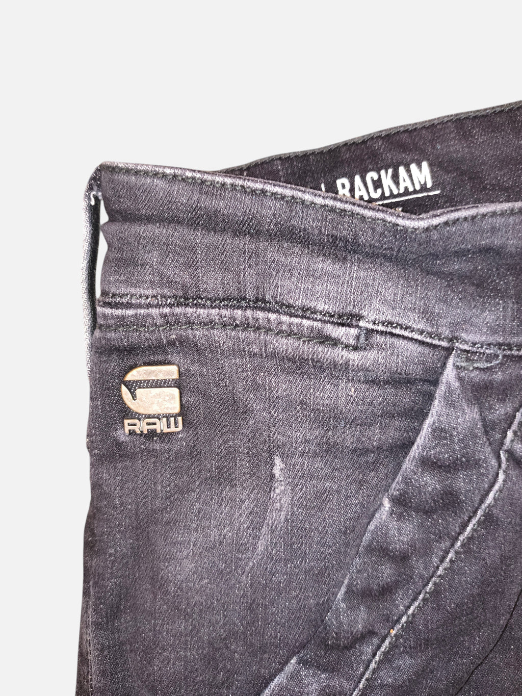 Awsum Thrift G-Raw RackHam black denim jeans with branded metal logo detail on the front pocket
