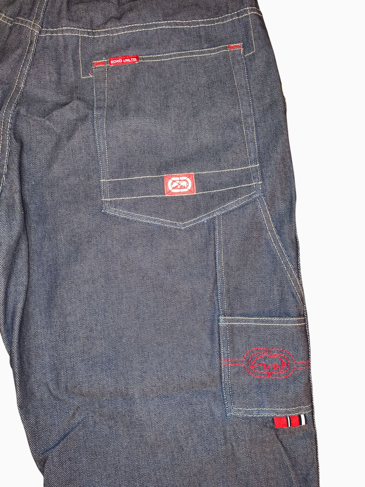 Awsum Thrift vintage Marc Ecko dark indigo denim carpenter jeans with red contrast stitching and embroidered rhino logo